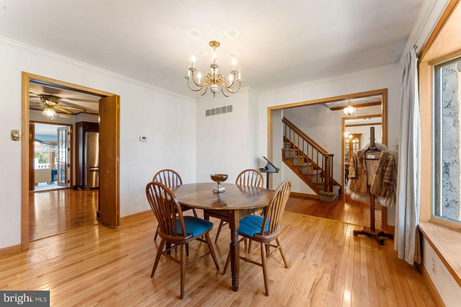 2015 Butternut Drive Huntingdon Valley, PA 19006 - Photo 12 of 40 a view of a dining room with furniture wooden floor and chandelier
