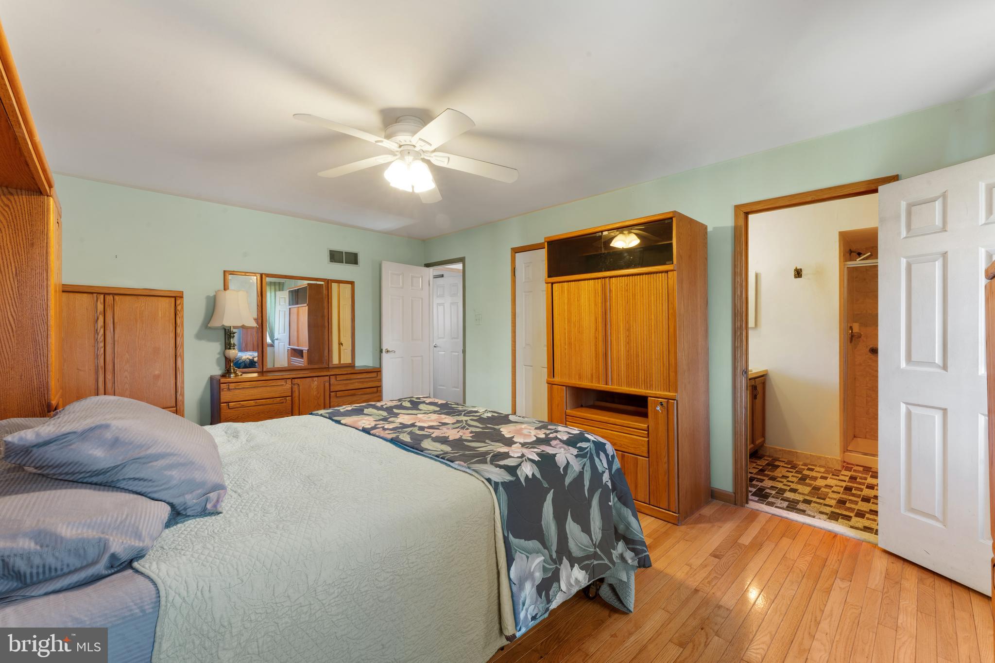 2015 Butternut Drive Huntingdon Valley, PA 19006 - Photo 36 of 40 a bedroom with a bed and wooden floor