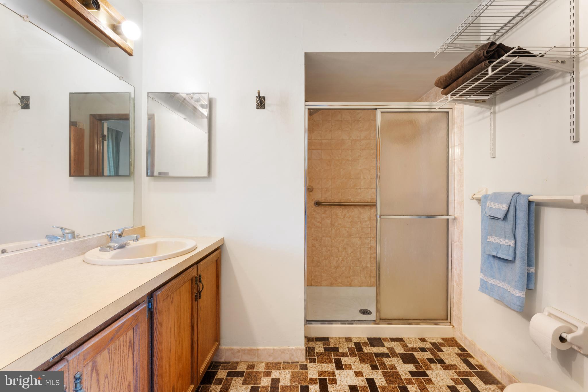 2015 Butternut Drive Huntingdon Valley, PA 19006 - Photo 37 of 40 a bathroom with a sink and a mirror