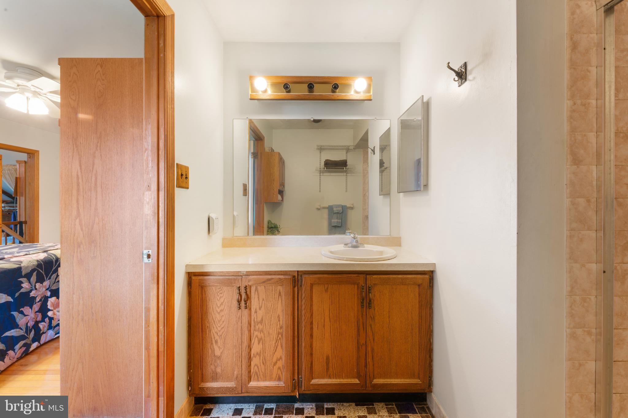 2015 Butternut Drive Huntingdon Valley, PA 19006 - Photo 38 of 40 a bathroom with a sink and a mirror