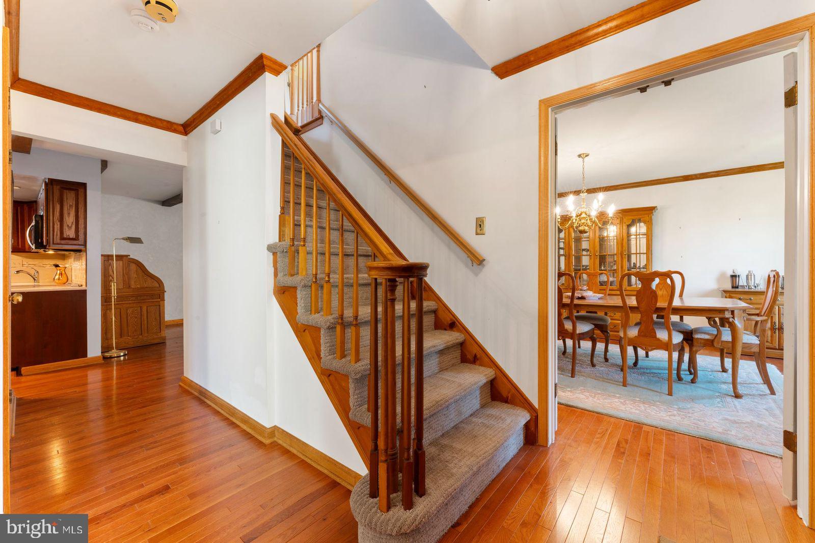 2015 Butternut Drive Huntingdon Valley, PA 19006 - Photo 10 of 40 a view of a hallway view with wooden floor and staircase
