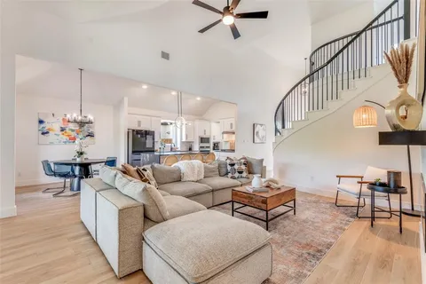 a living room with furniture and a table