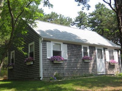 200 Pilgrim Spring Road, Unit B Wellfleet, MA 02667 - Photo 1 of 13 a view of house with a backyard