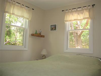 200 Pilgrim Spring Road, Unit B Wellfleet, MA 02667 - Photo 5 of 13 a bathroom with a window and a shower