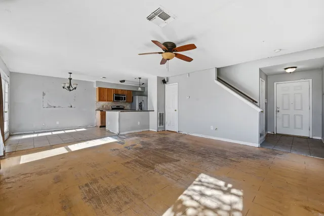 a view of a livingroom with a flat screen tv