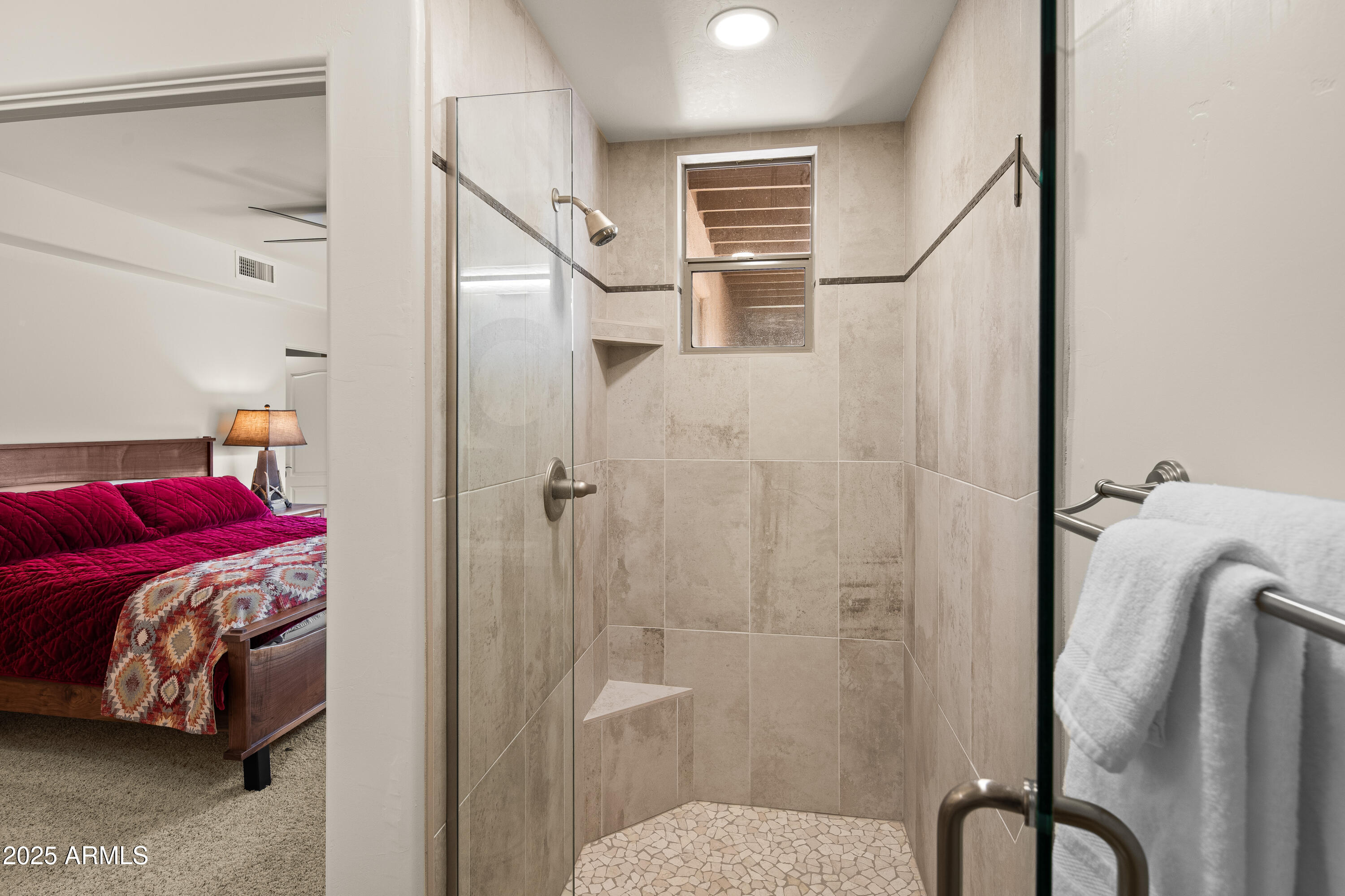 520 Jordan Road, Unit 2 Sedona, AZ 86336 - Photo 15 of 34 a view of a bedroom with a bed and furniture