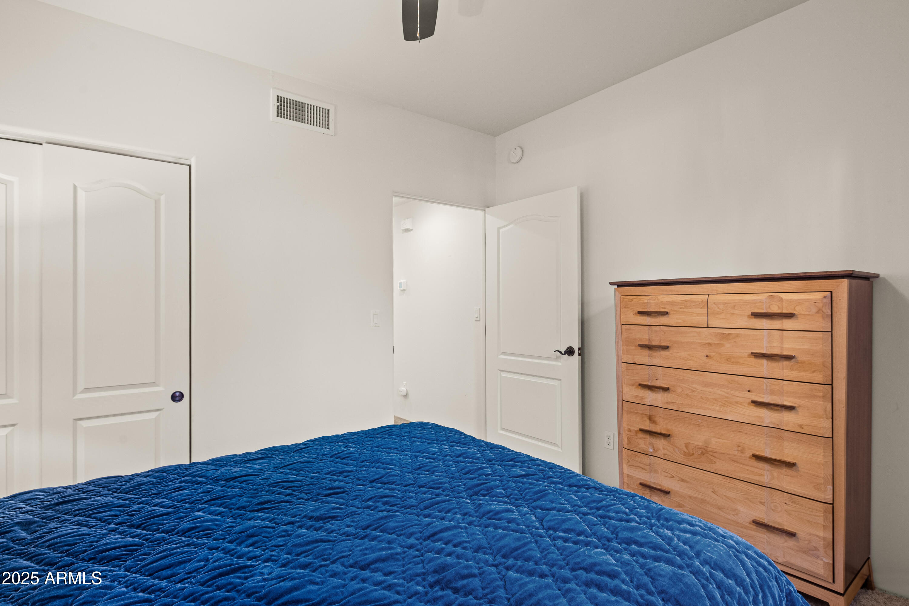 520 Jordan Road, Unit 2 Sedona, AZ 86336 - Photo 19 of 34 a view of a bedroom with wooden floor