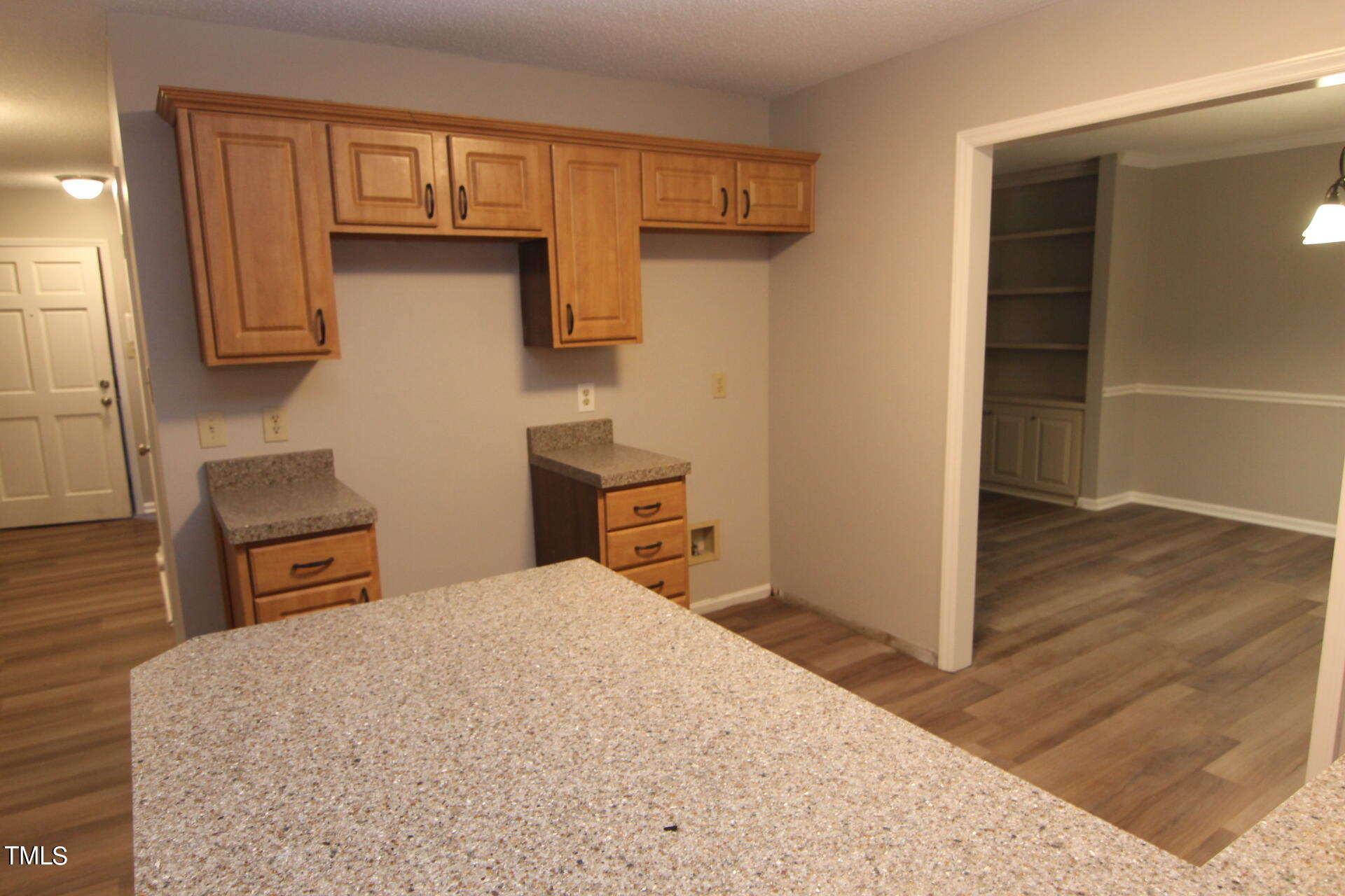 3313 Singleleaf Lane Raleigh, NC 27616 - Photo 4 of 25 a kitchen with stainless steel appliances a refrigerator and a stove top oven