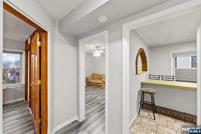 a view of a bathroom from the hallway