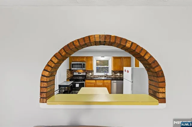 a bathroom with a sink and mirror