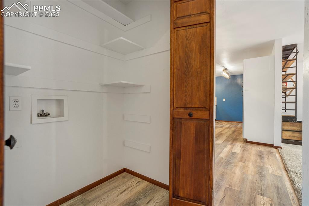 57 Aspen Circle Divide, CO 80814 - Photo 18 of 50 a view of empty room with wooden floor and bathroom