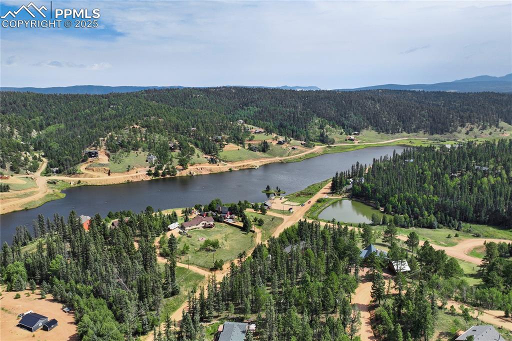 57 Aspen Circle Divide, CO 80814 - Photo 44 of 50 an aerial view of a house with a lake view