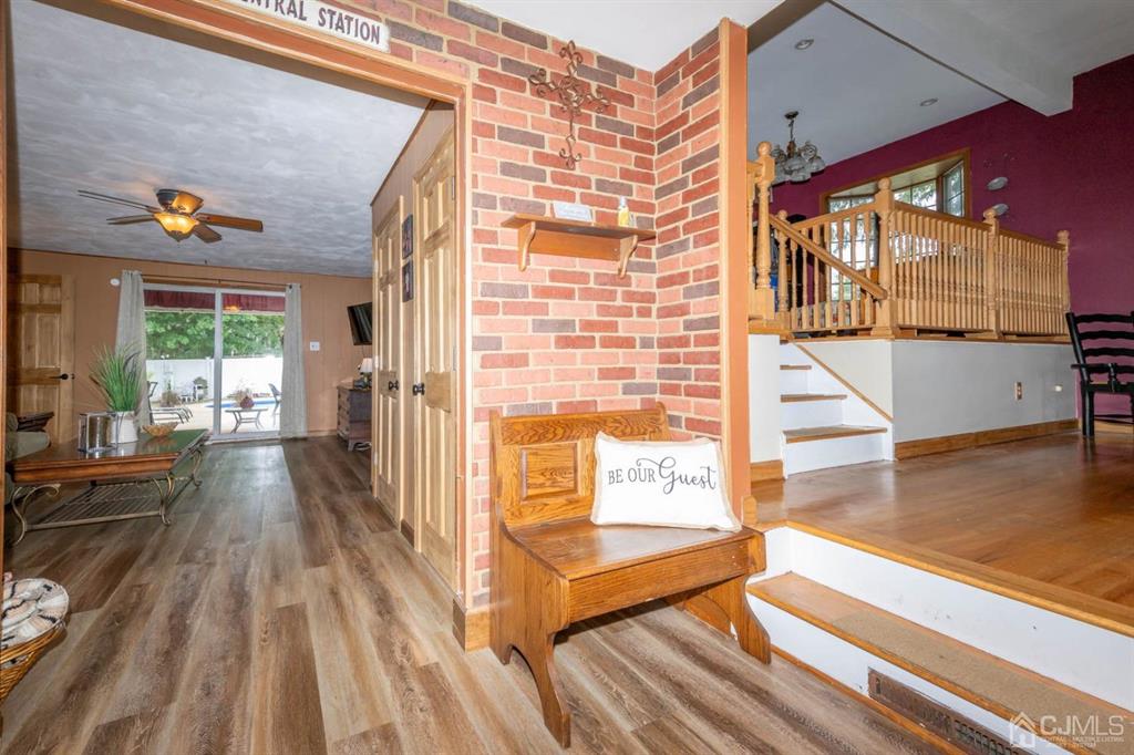 16 Hansen Road Old Bridge, NJ 08857 - Photo 2 of 32 a view of a balcony with floor to ceiling windows with wooden floor