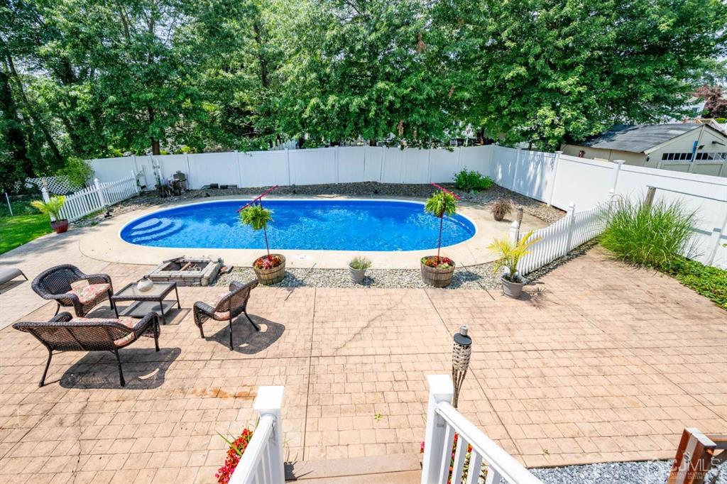 16 Hansen Road Old Bridge, NJ 08857 - Photo 23 of 32 a view of a swimming pool with a patio