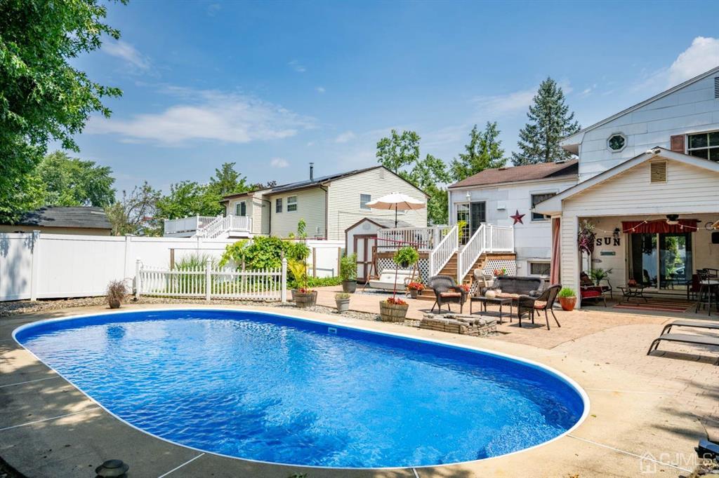 16 Hansen Road Old Bridge, NJ 08857 - Photo 28 of 32 a view of a swimming pool with outdoor seating