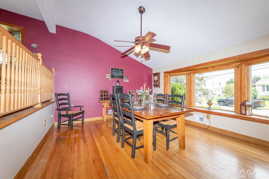 16 Hansen Road Old Bridge, NJ 08857 - Photo 4 of 32 a view of a dining room with furniture a chandelier and wooden floor