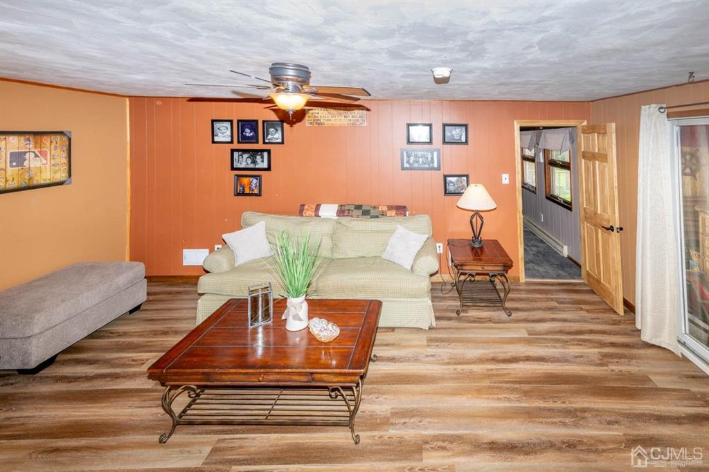 16 Hansen Road Old Bridge, NJ 08857 - Photo 8 of 32 a living room with furniture and a rug