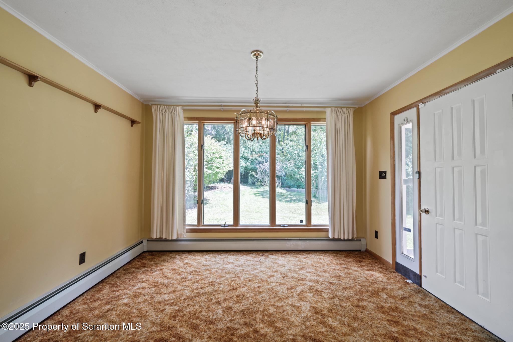 378 Gravel Pond Road Clarks Summit, PA 18411 - Photo 12 of 30 a view of an empty room with a window