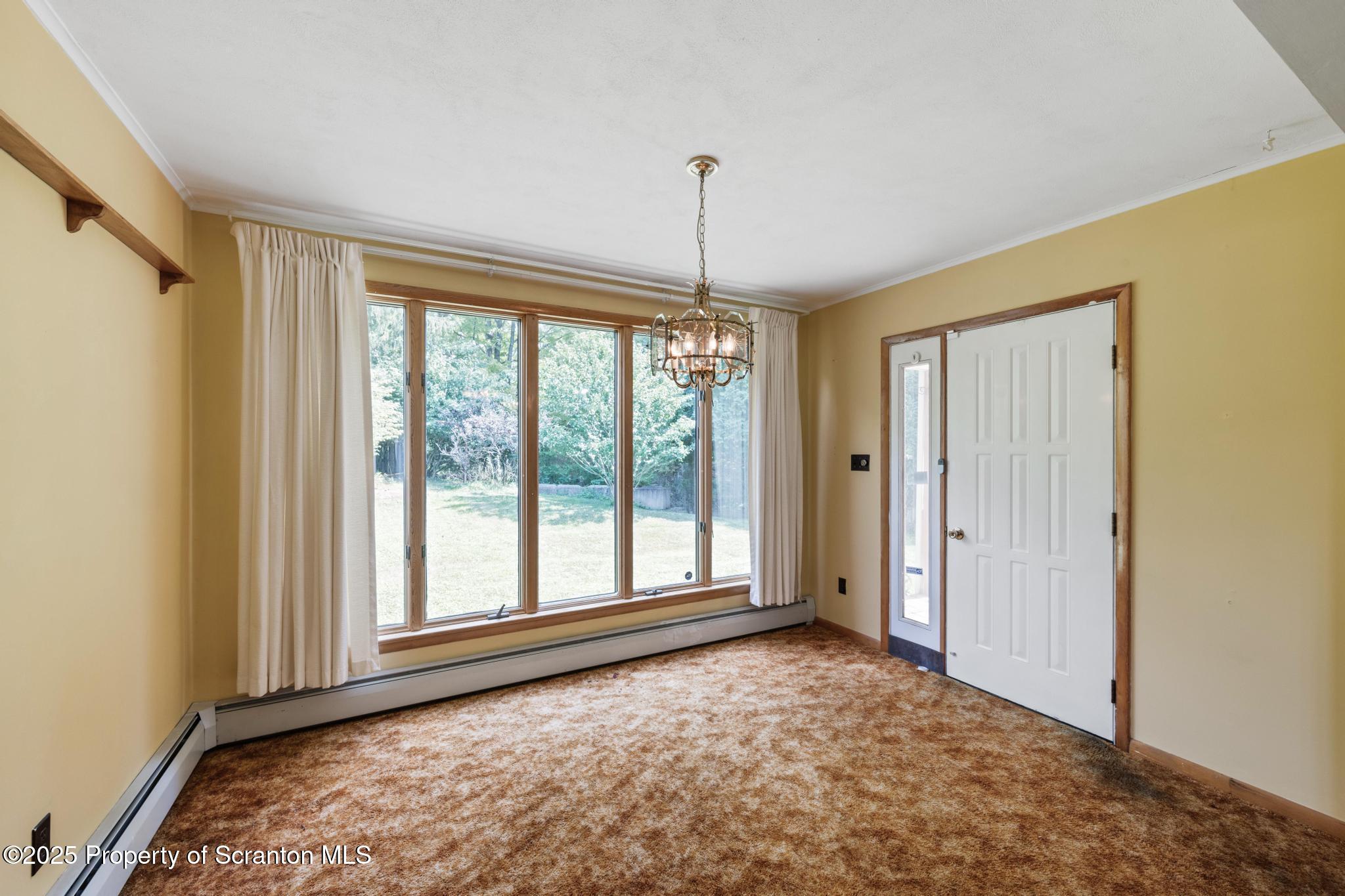 378 Gravel Pond Road Clarks Summit, PA 18411 - Photo 13 of 30 a view of an empty room with a window