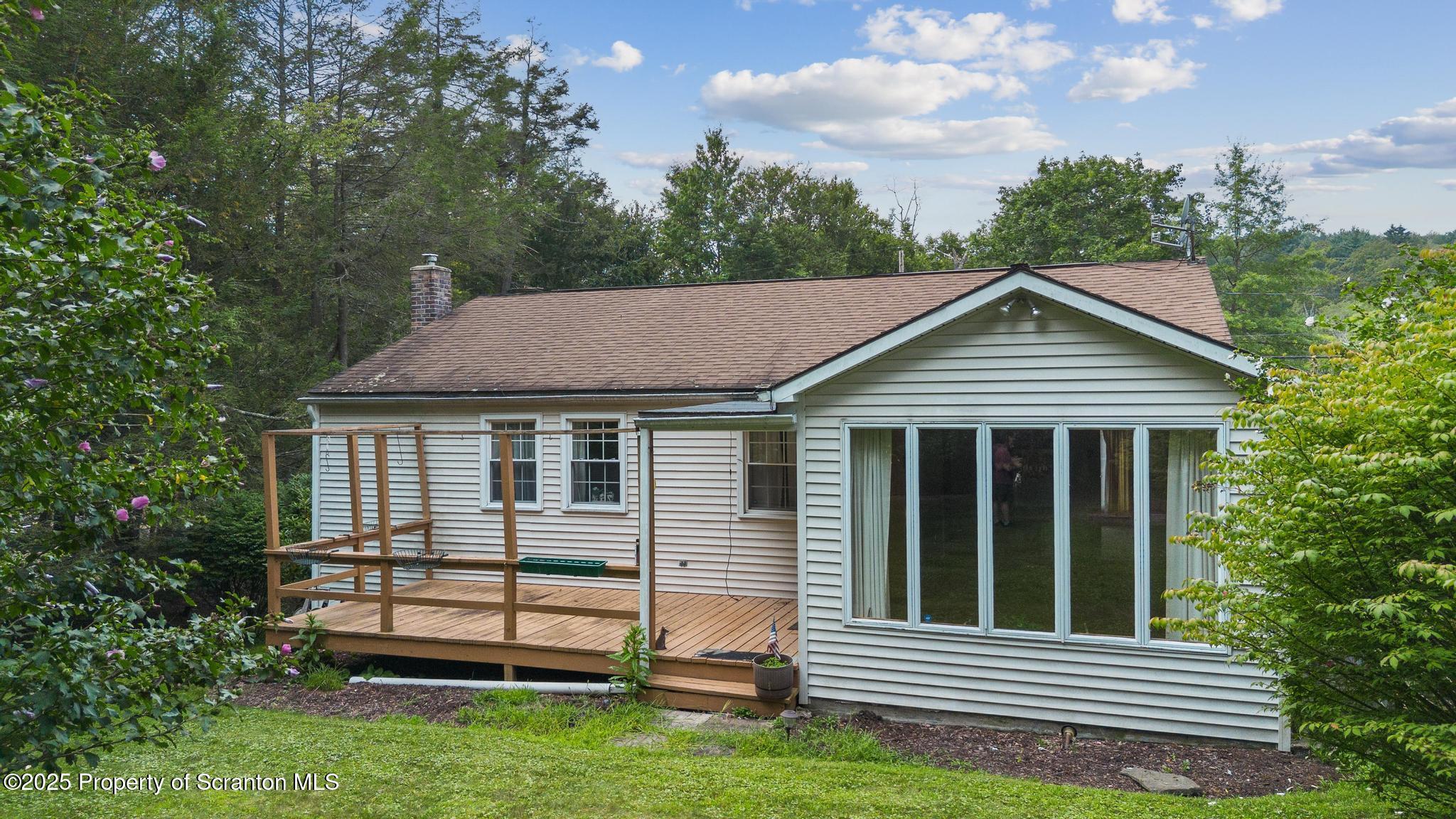 378 Gravel Pond Road Clarks Summit, PA 18411 - Photo 29 of 30 a view of a house with a yard