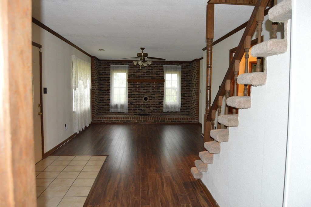 3520 Blue Springs Road Sweetwater, TN 37874 - Photo 16 of 49 wooden floor in an empty room with a window