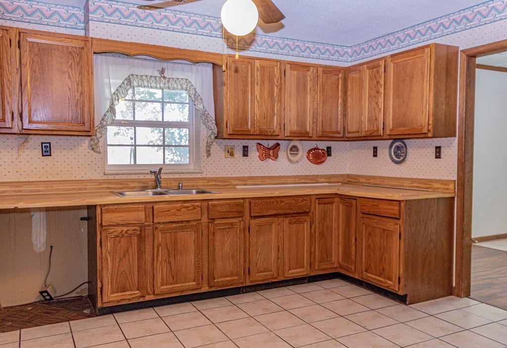 3520 Blue Springs Road Sweetwater, TN 37874 - Photo 20 of 49 a kitchen with a sink and cabinets