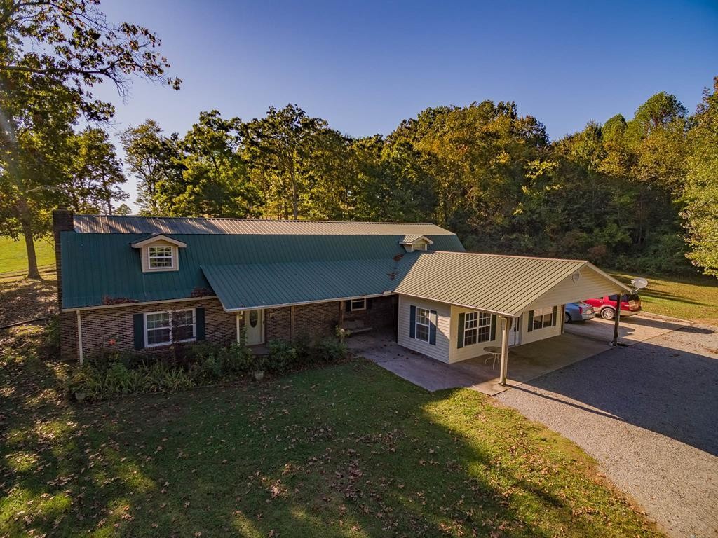 3520 Blue Springs Road Sweetwater, TN 37874 - Photo 2 of 49 an aerial view of a house with a yard and sitting area
