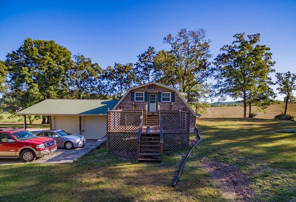 3520 Blue Springs Road Sweetwater, TN 37874 - Photo 37 of 49 a view of a house with a yard