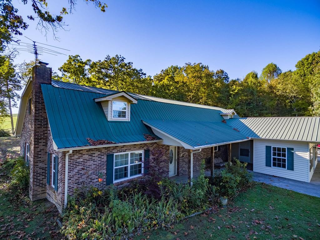 3520 Blue Springs Road Sweetwater, TN 37874 - Photo 43 of 49 a view of a house with a garden