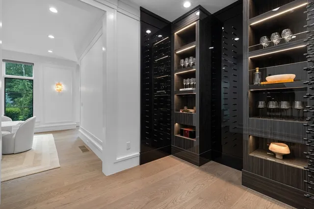 a view of hall way with furniture