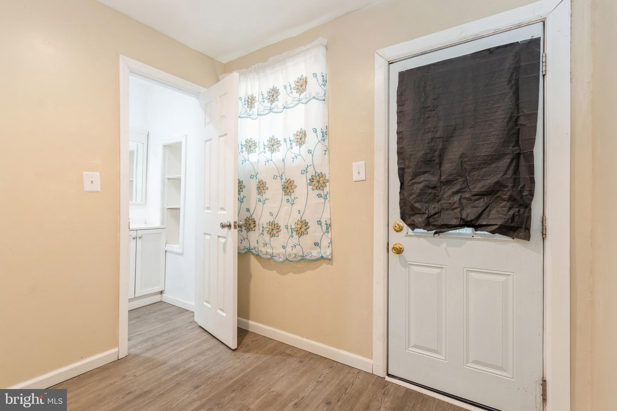 1223 Decatur Street Camden, NJ 08104 - Photo 7 of 25 Back Room Leads to half bathroom