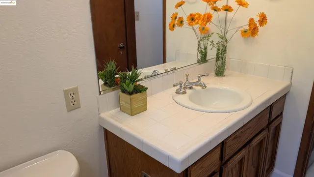 a bathroom with a toilet and a sink