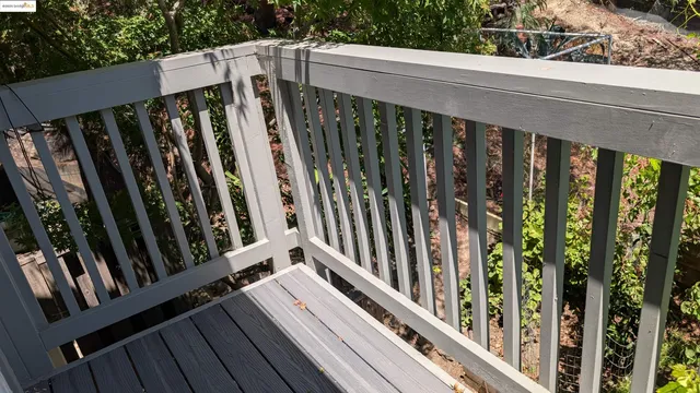a view of a balcony with an outdoor space