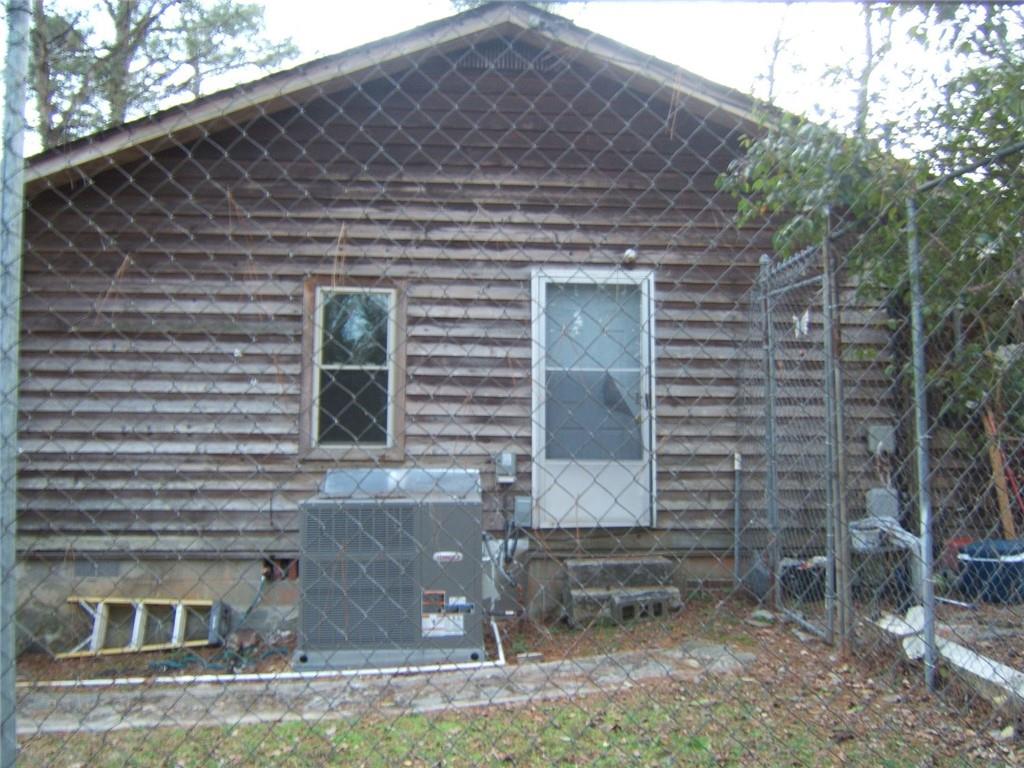2026 Kimberly Road Southwest Atlanta, GA 30331 - Photo 3 of 11 a front view of a house with parking