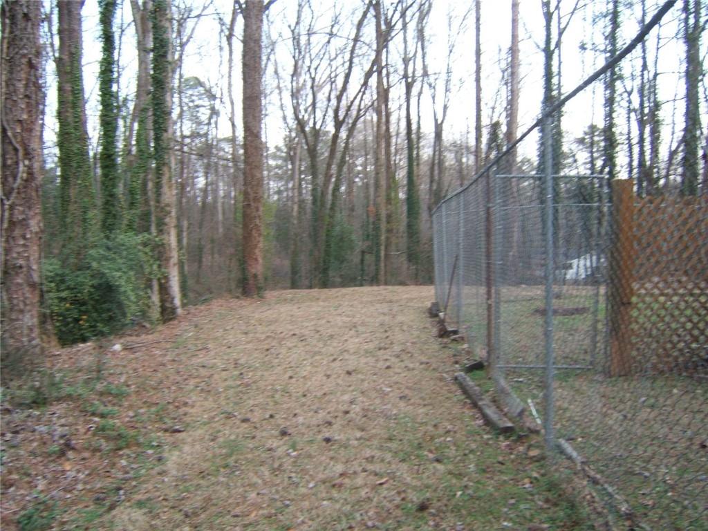 2026 Kimberly Road Southwest Atlanta, GA 30331 - Photo 6 of 11 a view of a backyard with trees
