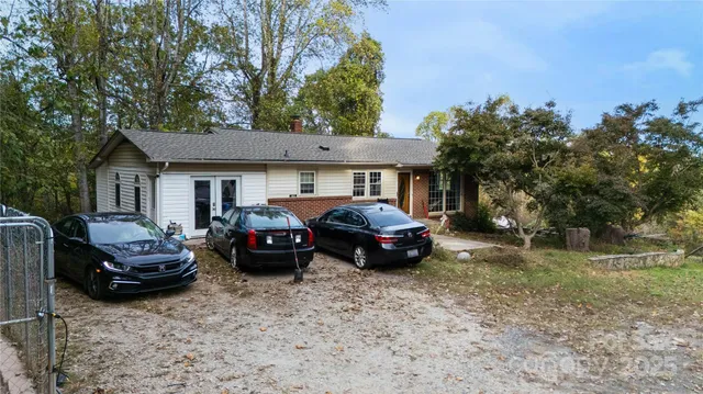 a car parked in front of a house