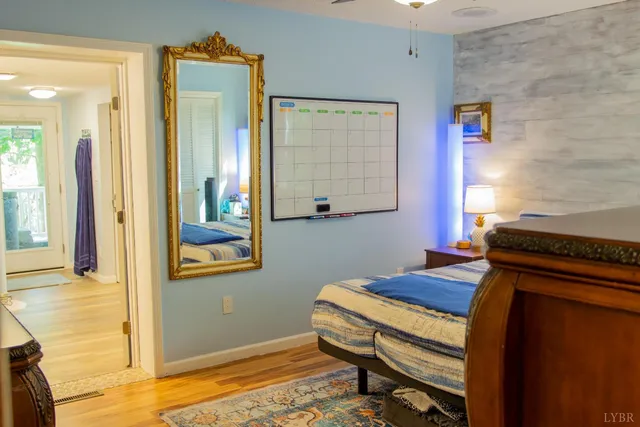 a view of a dresser with wooden floor