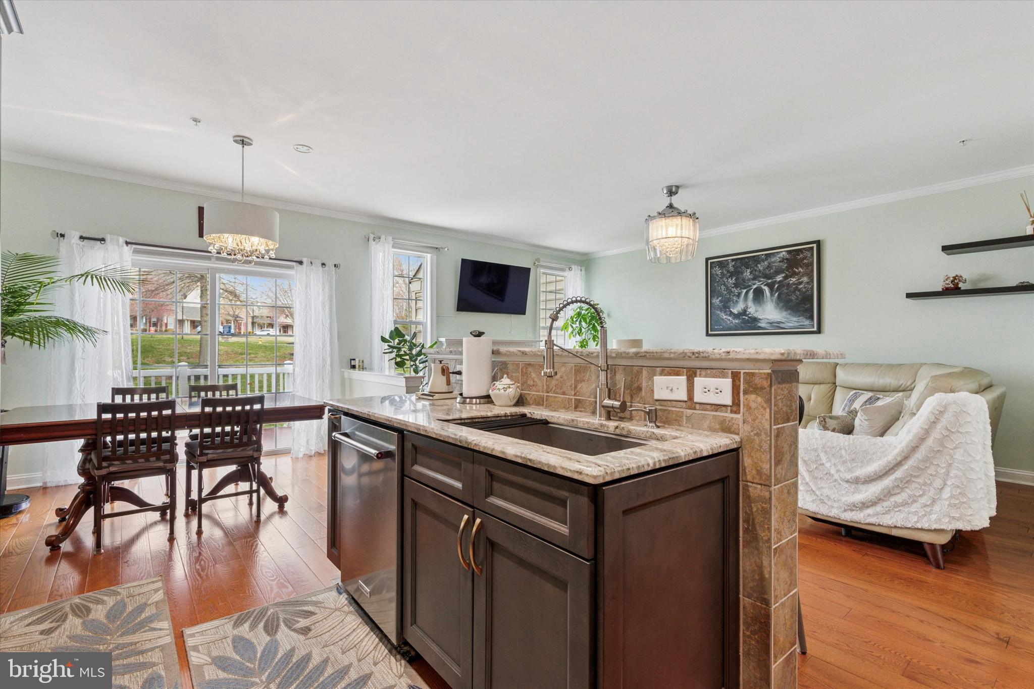 3229 Meadow View Circle, Unit 157 Furlong, PA 18925 - Photo 11 of 28 a view of a kitchen area with furniture and wooden floor