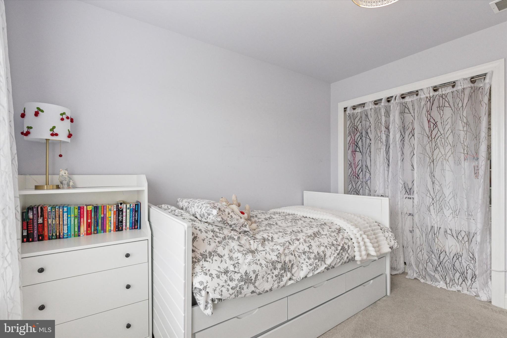 3229 Meadow View Circle, Unit 157 Furlong, PA 18925 - Photo 20 of 28 a bedroom with a bed and walk in closet