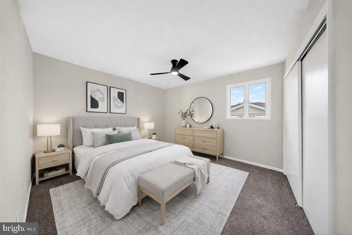 24 Vansant Road Newark, DE 19711 - Photo 15 of 44 a bedroom with bed and a window