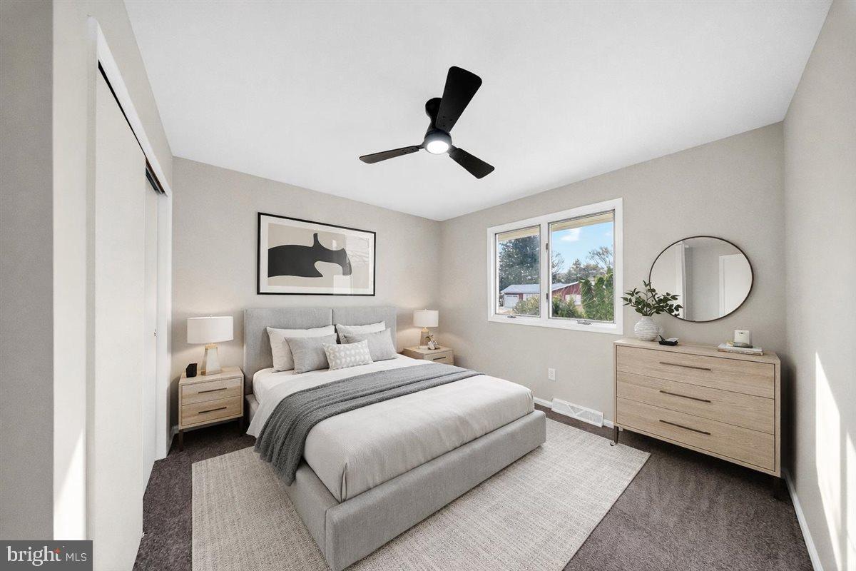 24 Vansant Road Newark, DE 19711 - Photo 18 of 44 a bedroom with a bed and a dresser