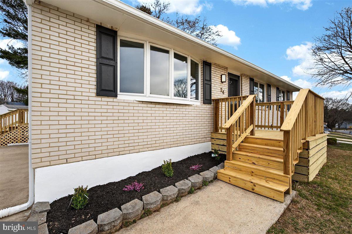 24 Vansant Road Newark, DE 19711 - Photo 3 of 44 a view of a house with a yard
