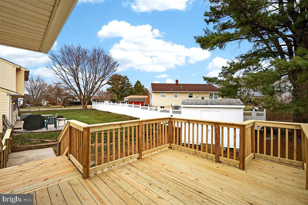 24 Vansant Road Newark, DE 19711 - Photo 35 of 44 a view of a deck with furniture and trees