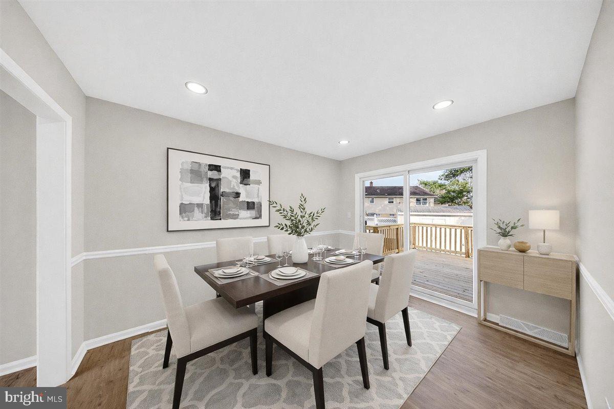 24 Vansant Road Newark, DE 19711 - Photo 9 of 44 a view of a dining room with furniture window and wooden floor