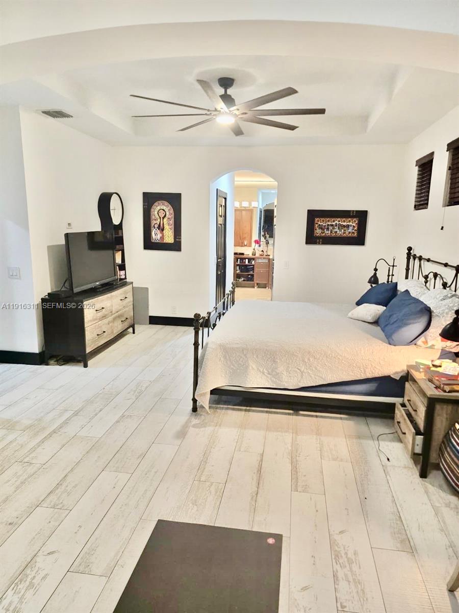 2019 Harbor View Circle Weston, FL 33327 - Photo 13 of 29 a bedroom with a bed and a dresser
