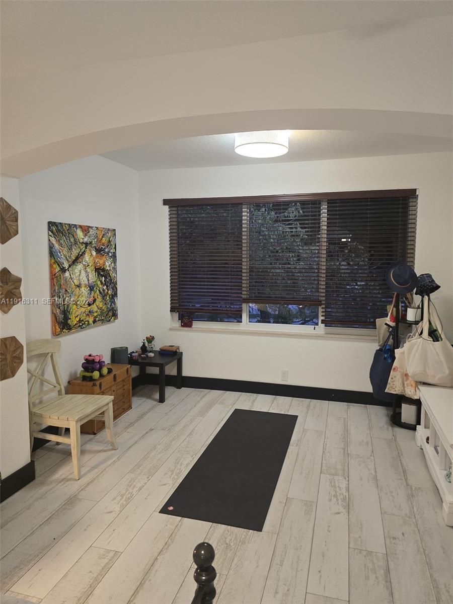 2019 Harbor View Circle Weston, FL 33327 - Photo 16 of 29 a living room with furniture and a flat screen tv