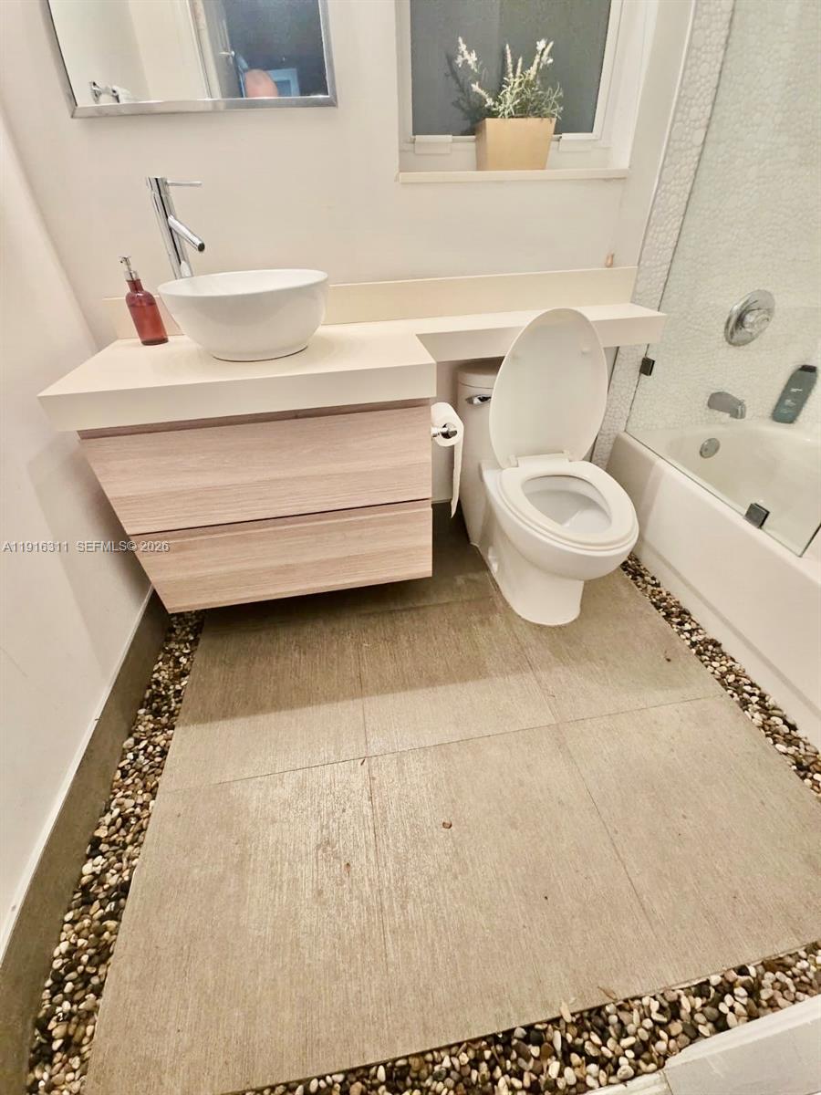 2019 Harbor View Circle Weston, FL 33327 - Photo 9 of 29 a bathroom with a sink toilet and shower