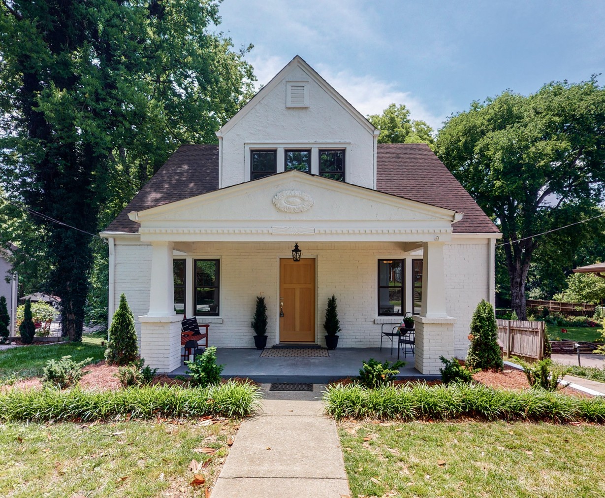 a front view of house with yard