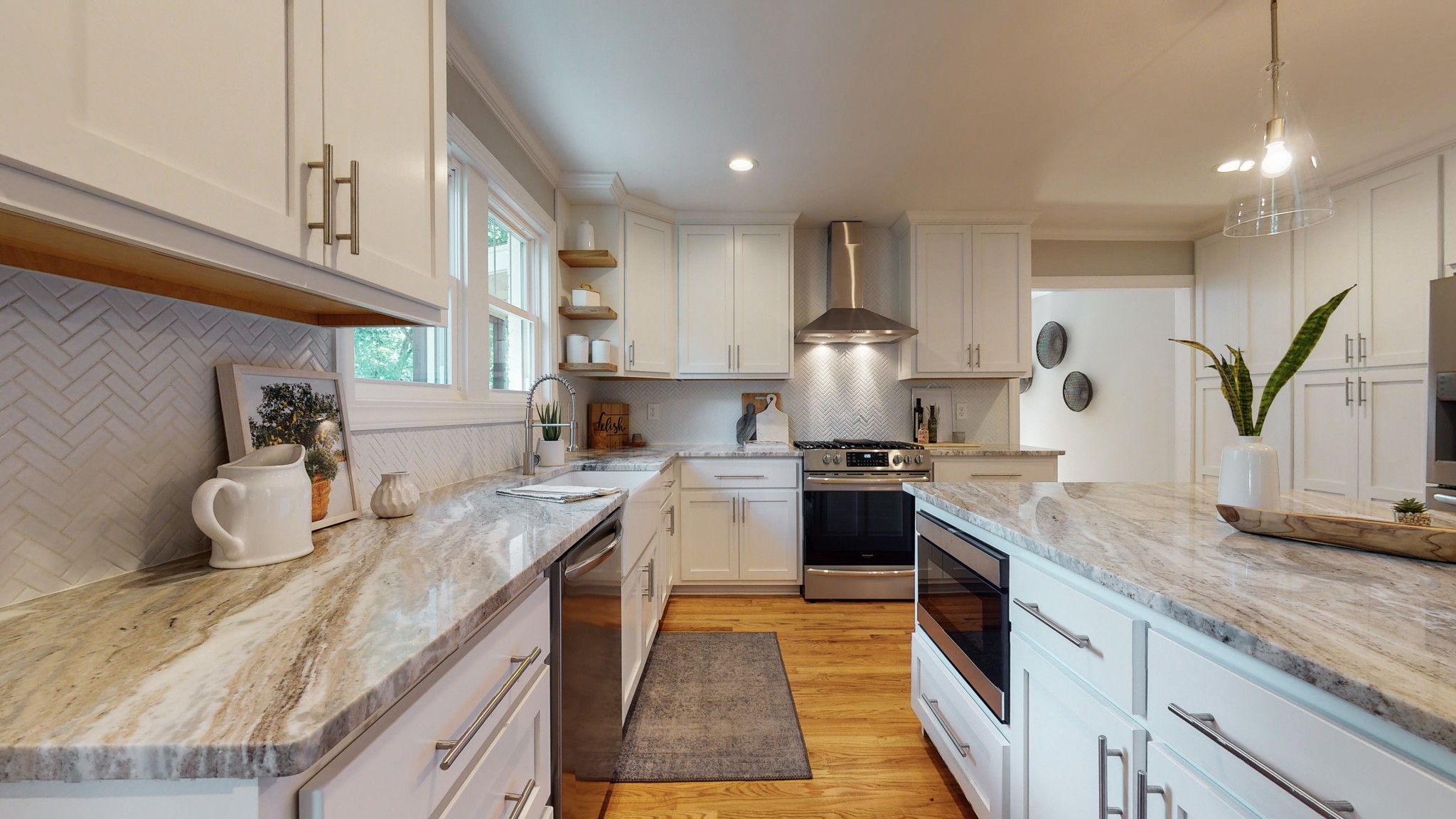 4109 Murphy Road Nashville, TN 37209 - Photo 13 of 31 a kitchen with stainless steel appliances granite countertop a sink stove and refrigerator