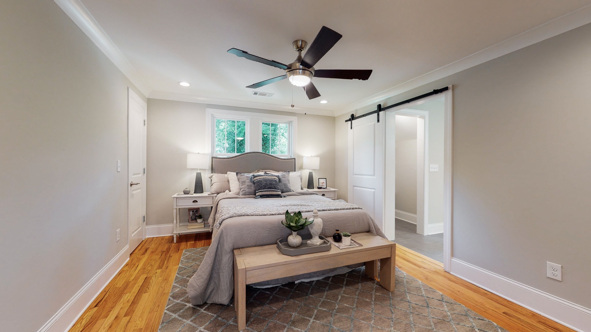 4109 Murphy Road Nashville, TN 37209 - Photo 17 of 31 a bed room with a bed and a window